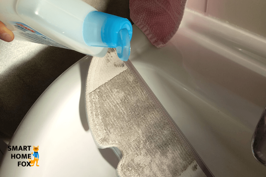 Adding organic cleaner to the mop of the robot vacuum with a mopping function